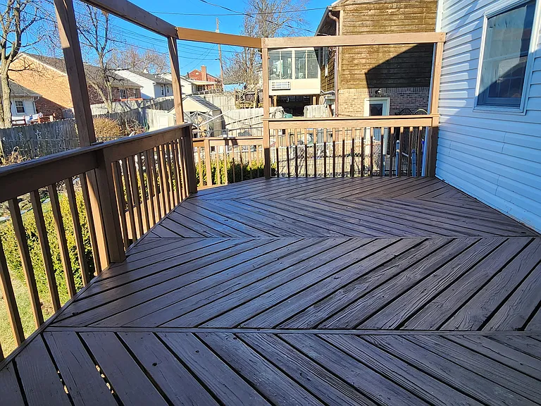 Enormous deck with support beam for custom shades