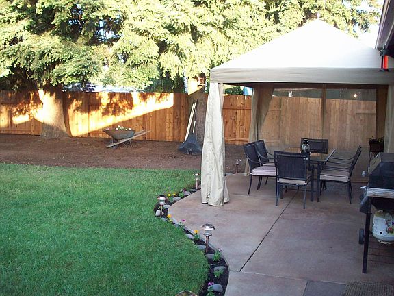 New Patio / Cedar Fence in background 