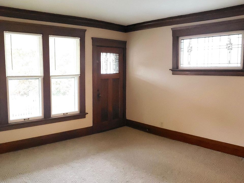 Living Room: Carpeted, Lots of natural light; access to front deck.