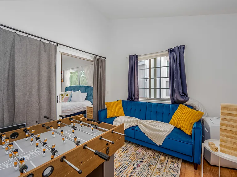 Ultimate entertainment and relaxation zone _ a versatile game room in the main house that doubles as a 2nd living space.