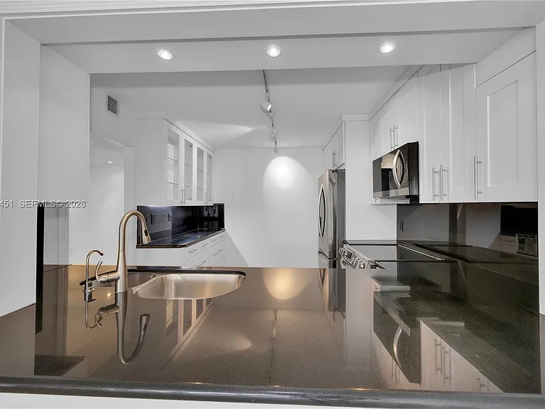 2 Grove Isle Dr #B907 — Photo 16