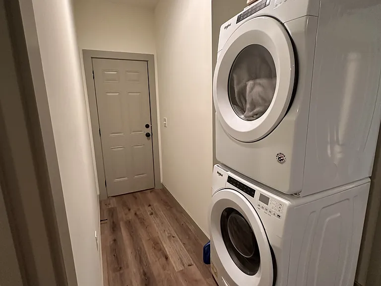 Stackable washer and dryer in unit