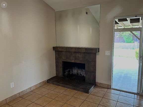 Fireplace, gliding class doors to covered patio