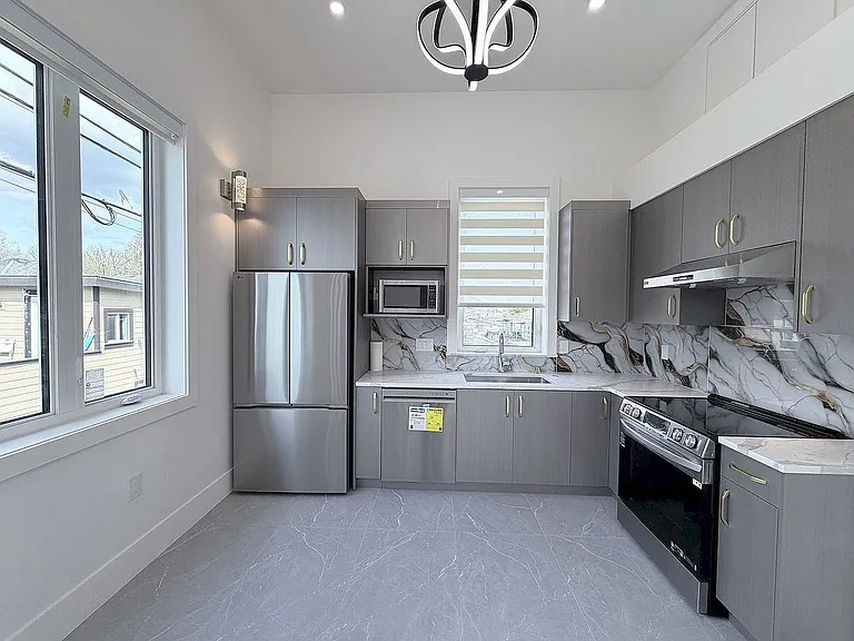 10XX E 62nd Ave — Photo 15