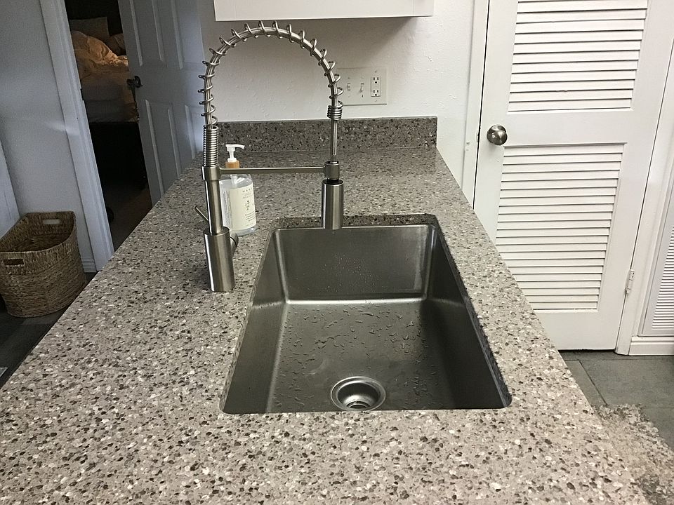 Kitchen with oversized sink and quartz countertop