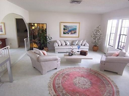 Living room with arches and lots of light