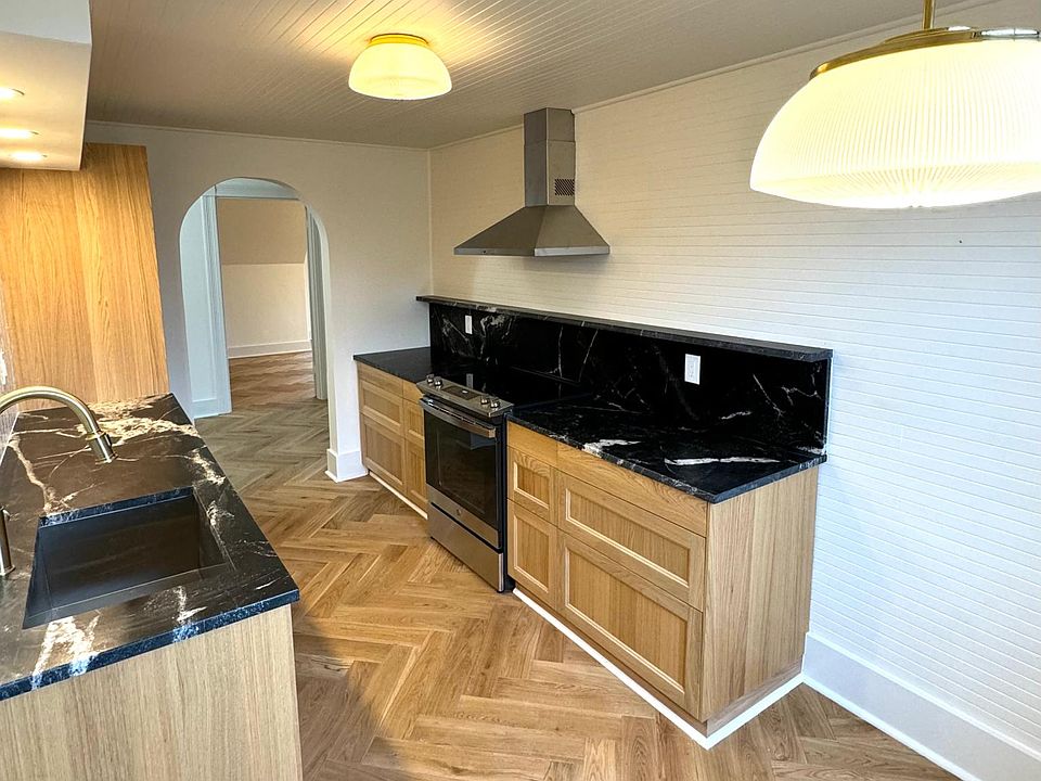 Kitchen with electric stove.