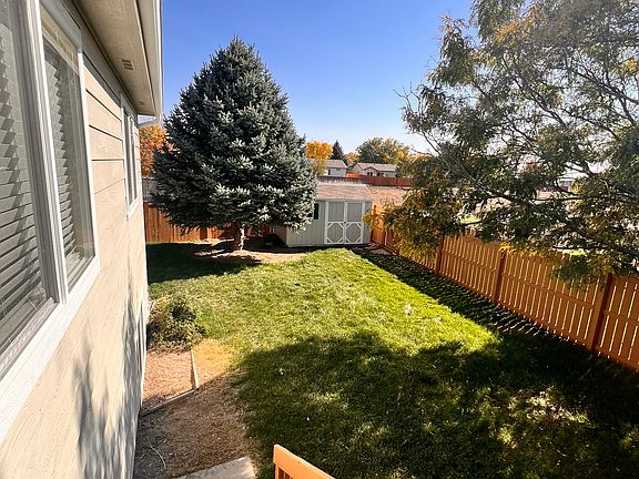 Fenced Backyard, open space behind home to the south