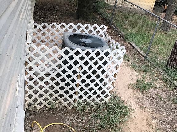 Behind house