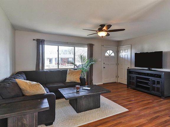 Lots of light from the large front and rear windows in the spacious living room!