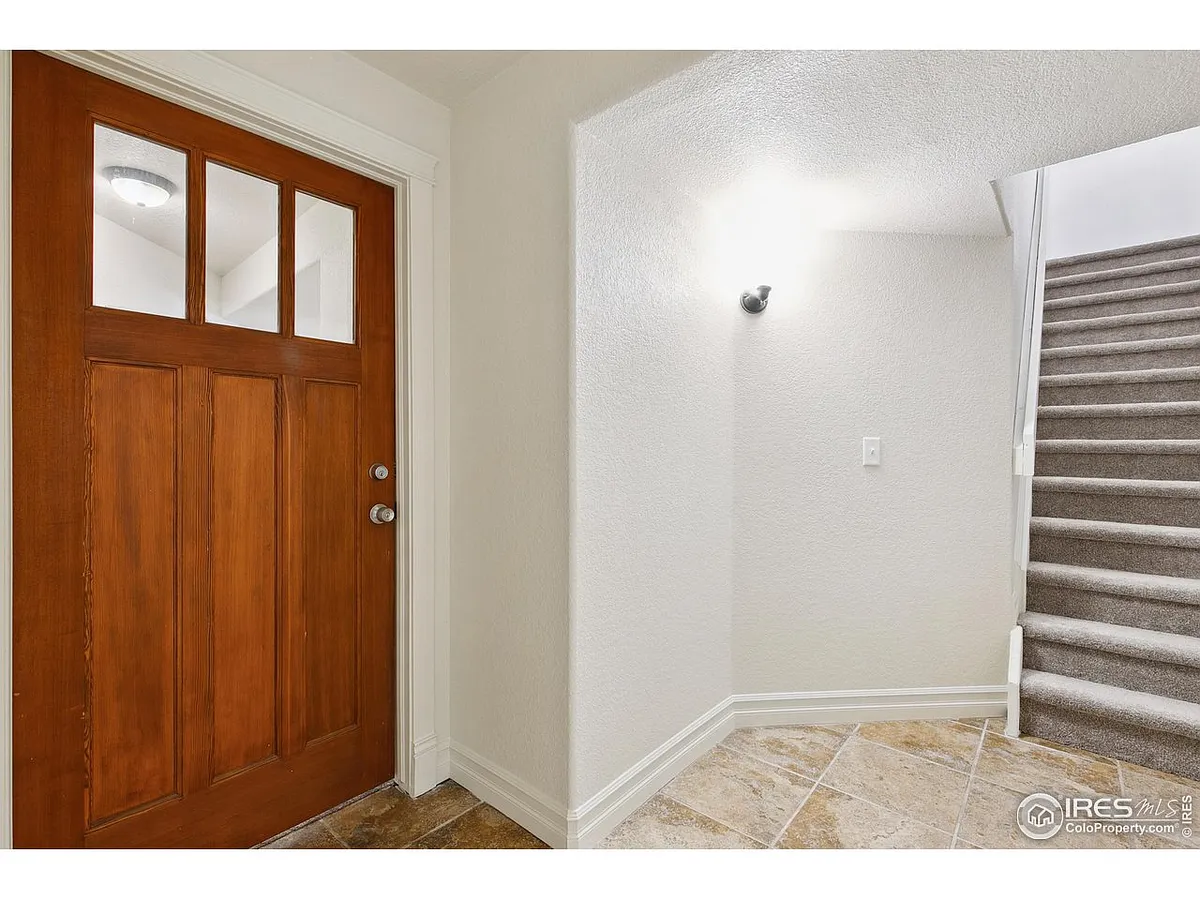 Owners & Tenant will share a back mudroom entrance at the top of the steps, then the stairs take you to your own private door & mudroom area pictured here. Door now has a coded keyless entry lock. - 1005 Laporte Ave