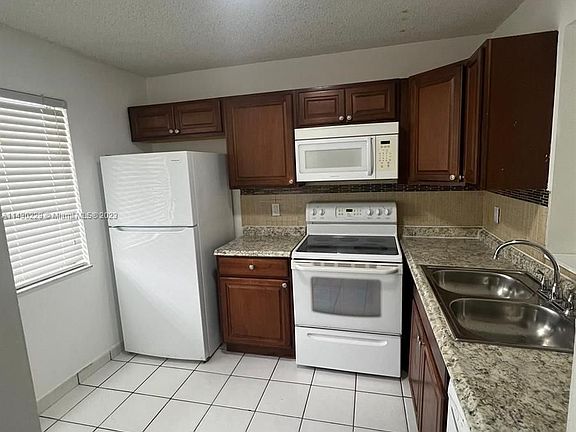 5th image of 8700 N Sherman Cir APT 506