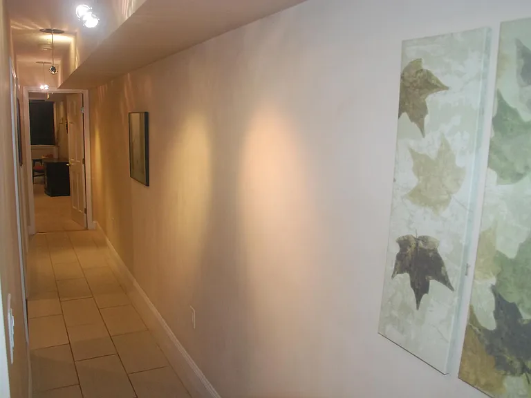 Looking down the long hallway to 2 Br 2 bath.