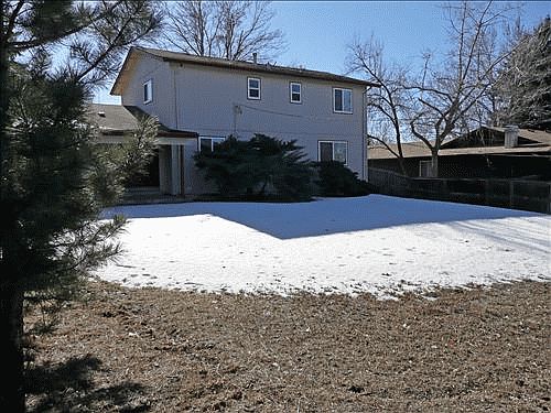 Large fenced and clock sprinkled yard