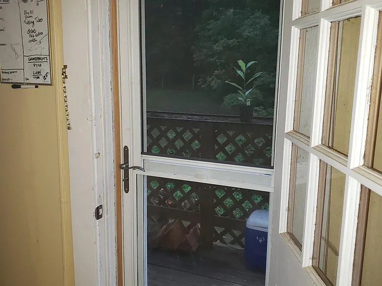 Private back door and small deck patio