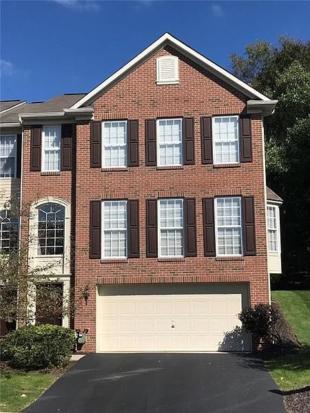 Beautiful Brick front end unit with double garage and side bay window.