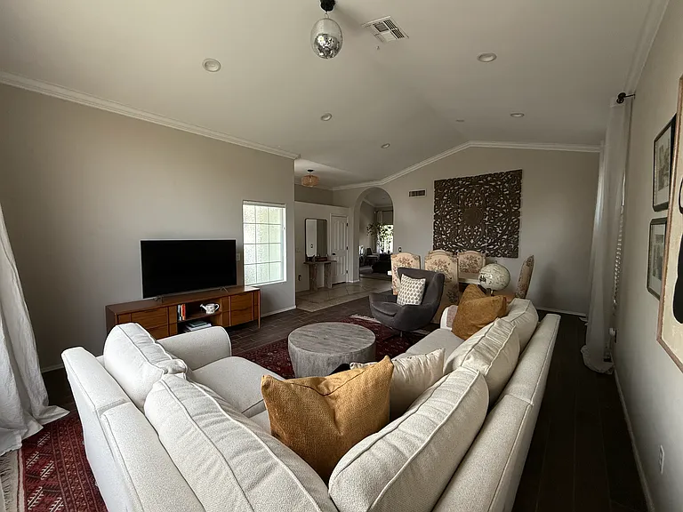 Expansive living area perfect for relaxing or hosting guests.