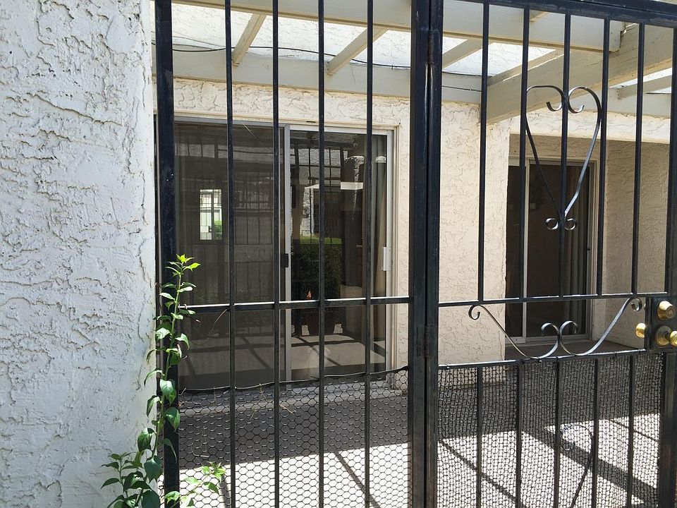 Gated entry to enclosed patio