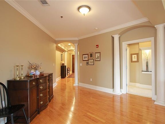 Welcoming foyer, flawless hardwoods throughout.