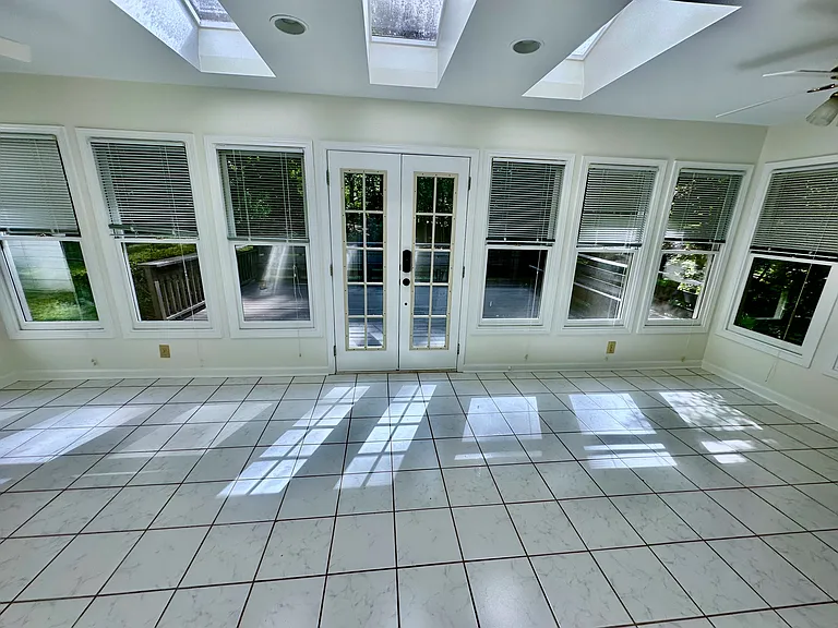 View from the Sunroom out to the large deck.