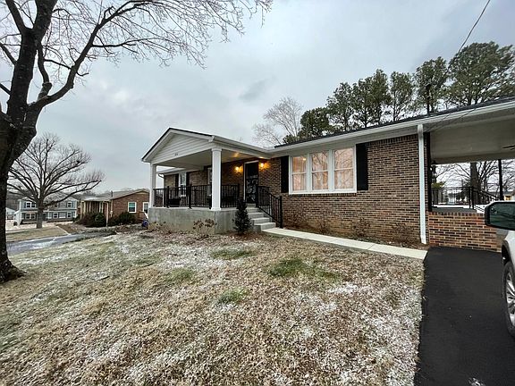 driveway to kitchen patio and front door