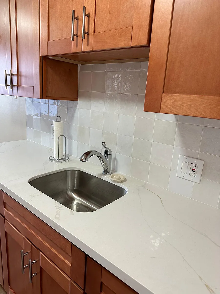 NEW stainless steel sink and pull out faucet. - 634 Grand Fir Ave #2