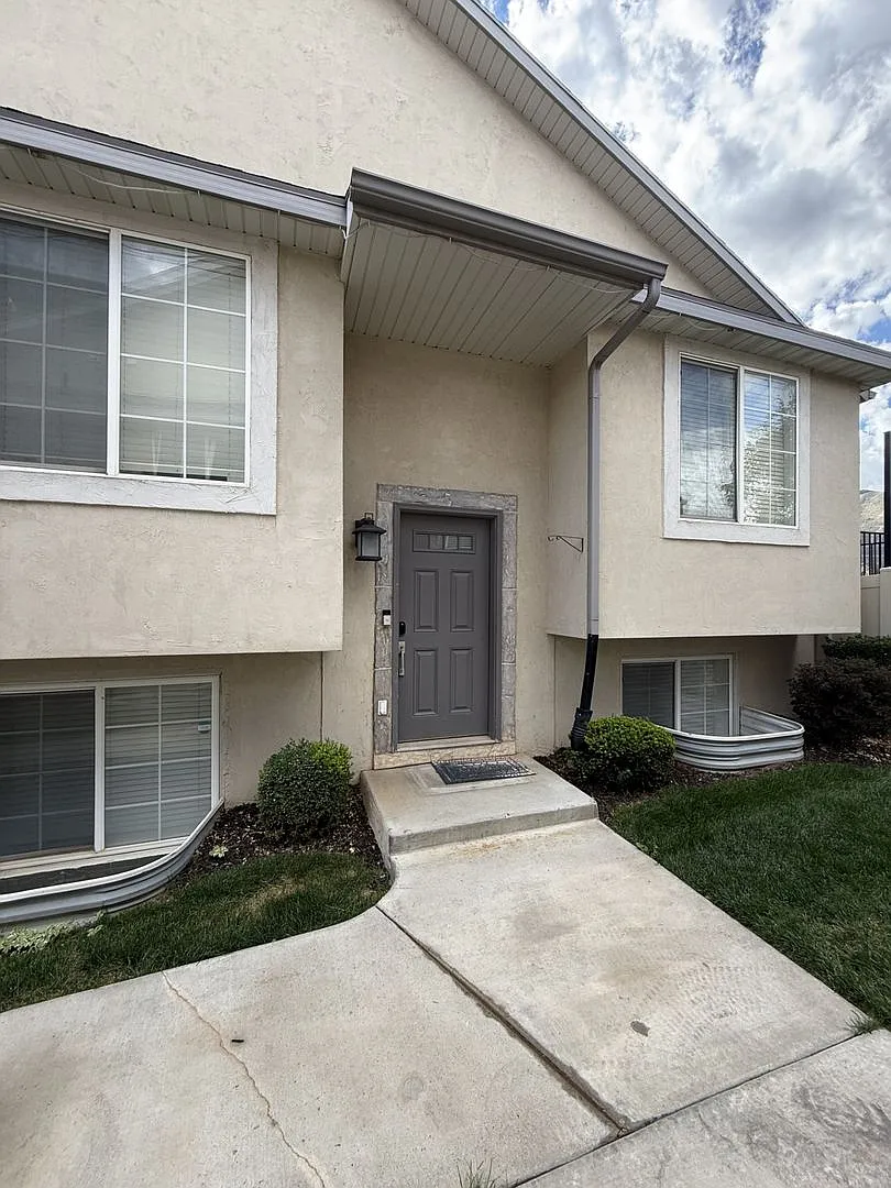 Welcome home to this spacious 4-bedroom, 3-bath residence in Spanish Fork, UT! — Photo 1