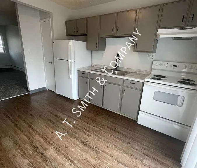 1875 Harlan St #6 — Photo 1
