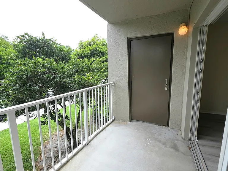 5051 Wiles Rd #201 — Photo 30