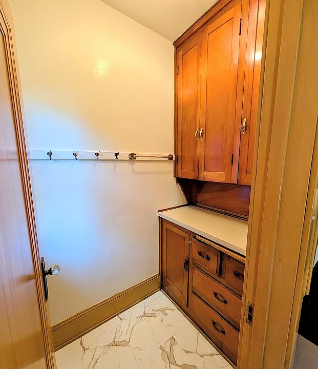 [LOWER UNIT]: Pantry off kitchen