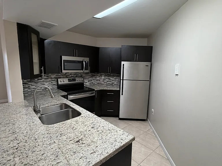 9711 Fontainebleau Blvd — Photo 17