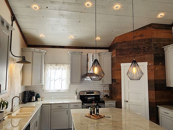 Kitchen with low halo light effect.