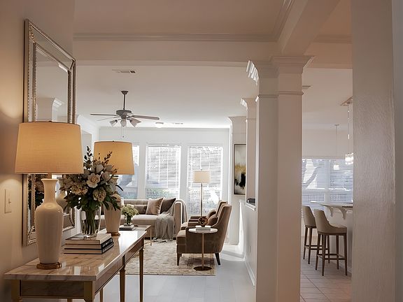 Grand entrance with brand-new French Oak-style flooring; virtually staged for a designer first impression.