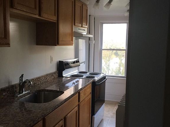 Galley Kitchen with granite countertop