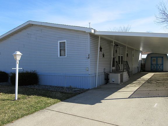 Carport & Shed Included