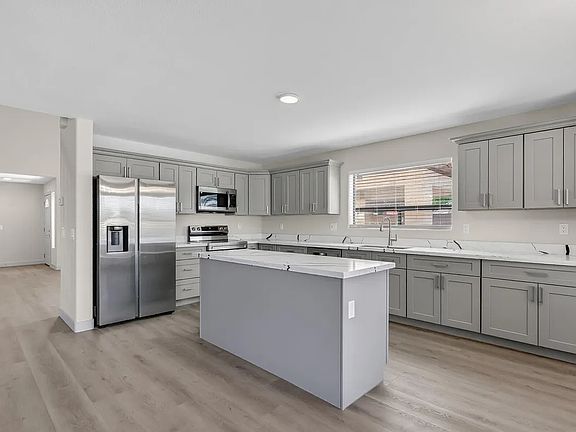 4th image of 10917 W Lewis Ave