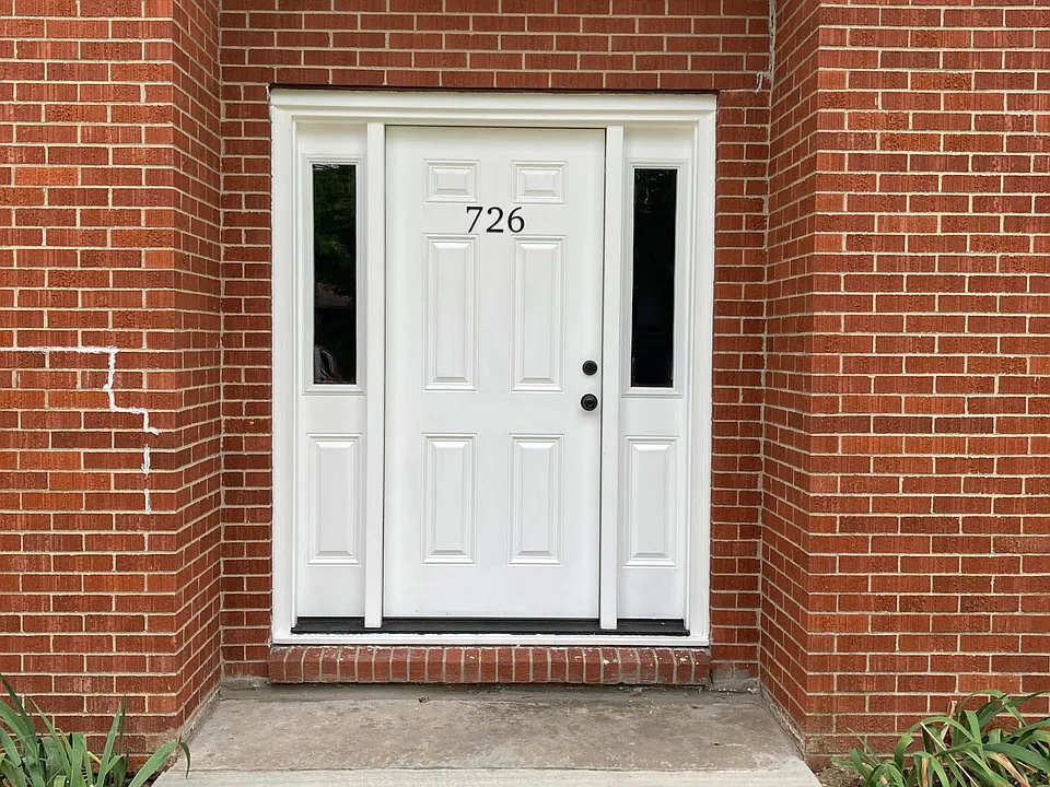 Keyed front door into entry hall.