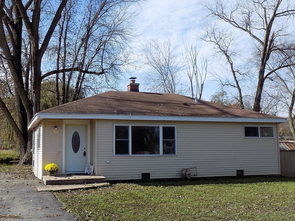 Welcome to 2418 W Channel Lane in Orchard Beach Subdivision.  This ranch home sits on .69 acres of land.  Located on the Channel that leads to the Fox River.