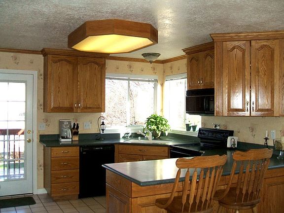 Great kitchen with solid surface countertops