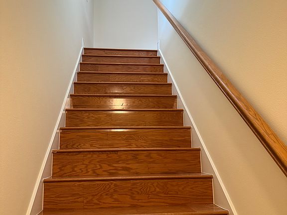 Interior staircase with access to private single car garage.