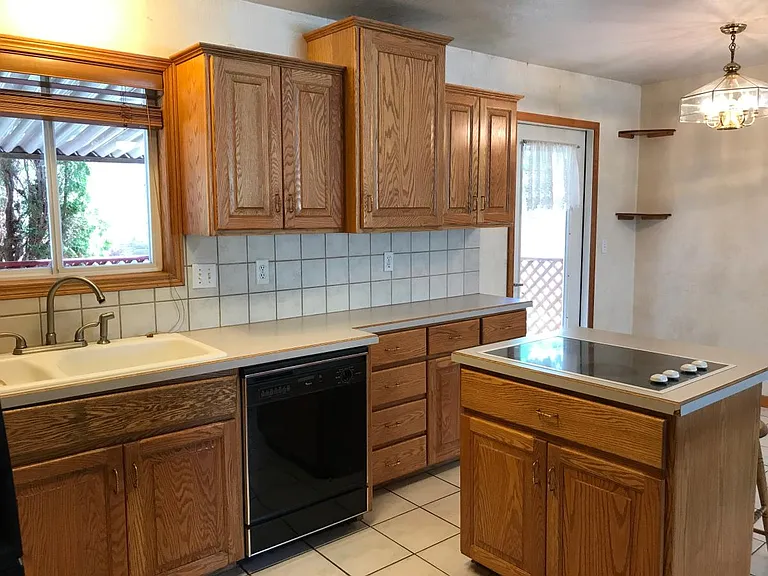 Kitchen looking out to back deck/yard