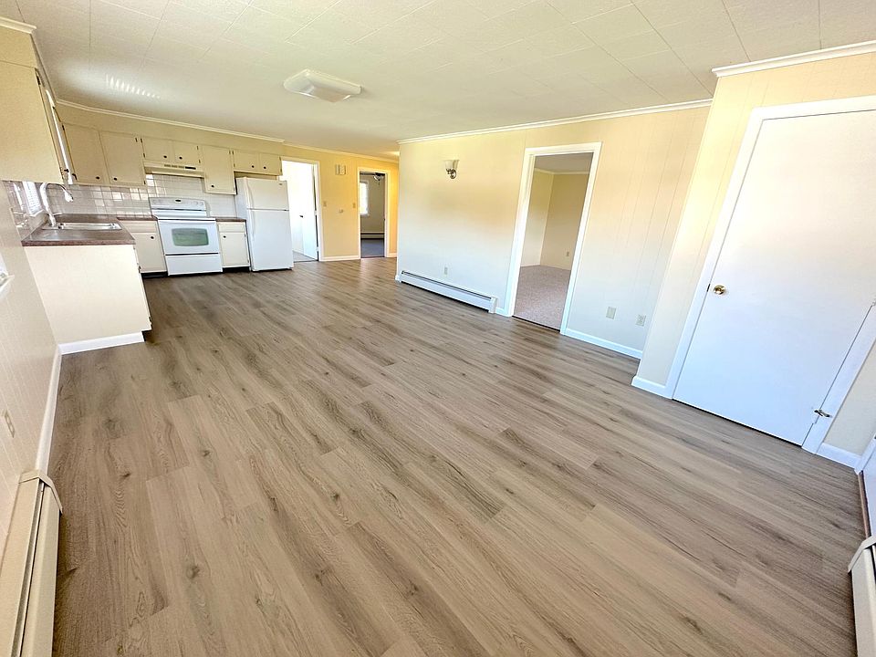 Living room is off the kitchen/dining- on your right.