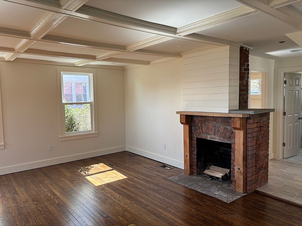 Living room with Beam ceilings