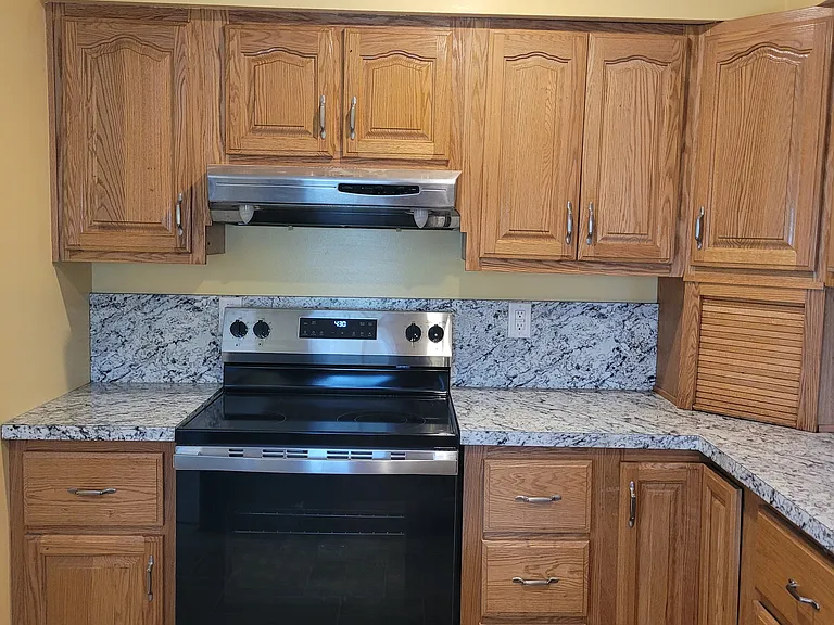 Kitchen, with brand new glass top stove