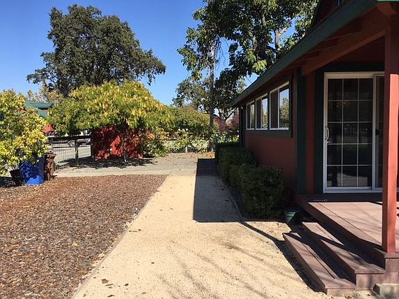 Sliding door access from mudroom/laundry porch to Trex deck