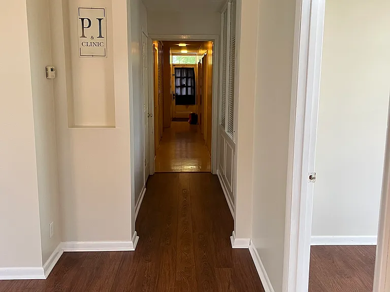 Hallway from front LR down to bedrooms