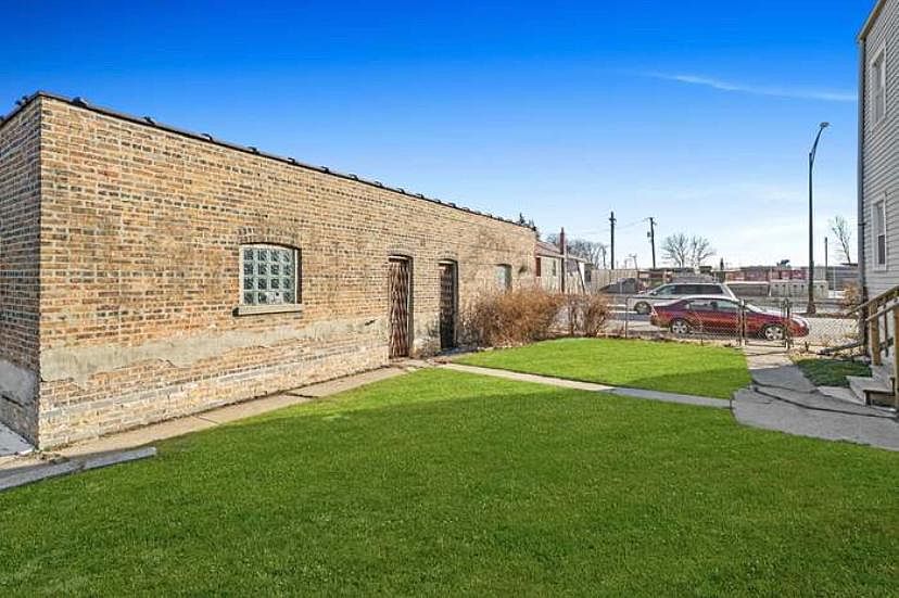 Back Yard Area w/ New concrete added for outdoor area use for BBQs or your kids to play etc