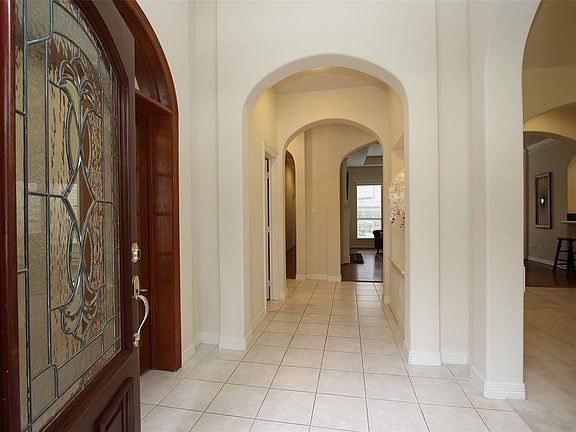 The arched entry way greets you upon entering.