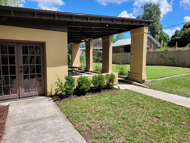 Double doors lead to finished bonus room with a/c for home office, storage, etc.