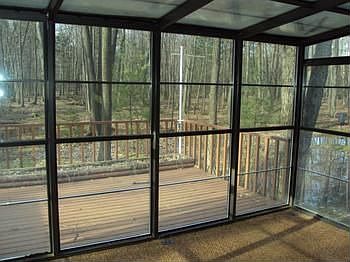 Glassed sun porch off the living room.